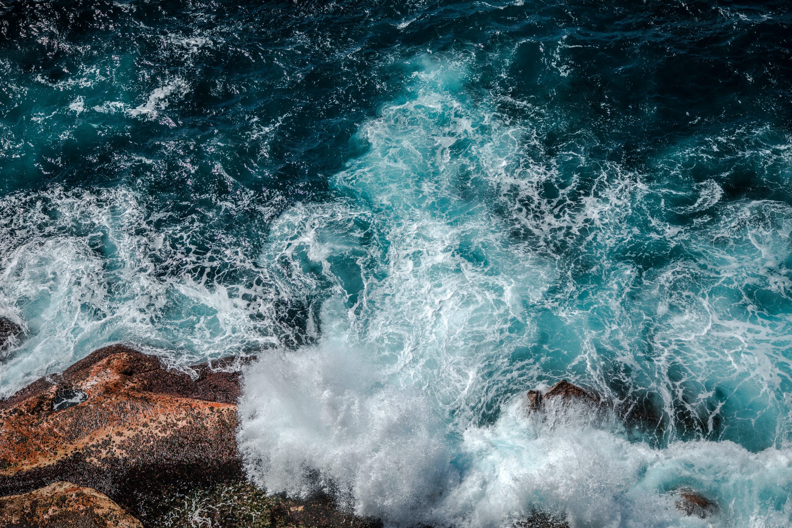 waves crashing against rocks